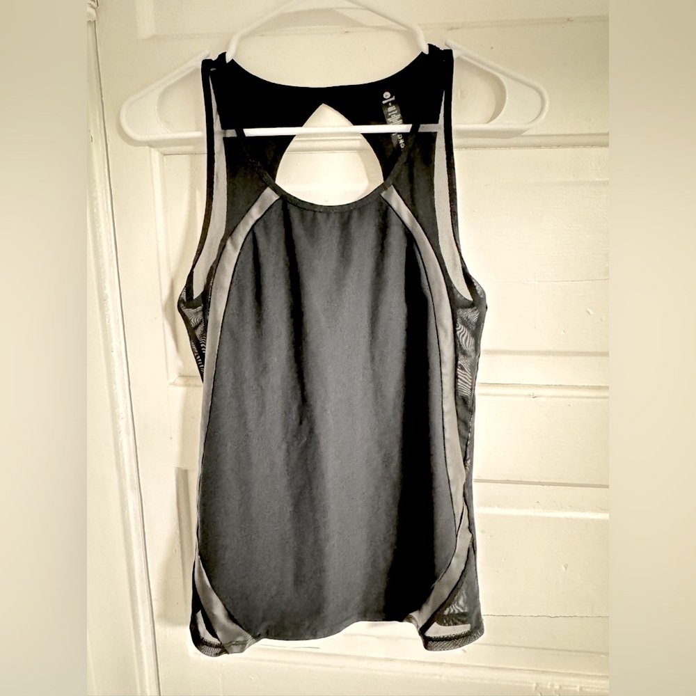 90 Degrees by Reflex - Black body hugging Workout top with mesh on the sides